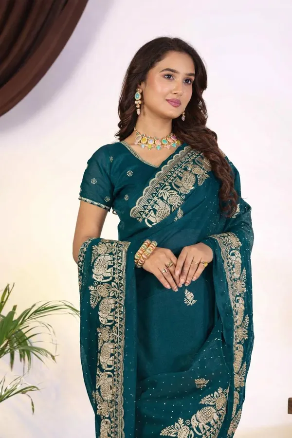 Teal_Blue_Georgette_Saree_with_Elephant_&_Floral_Zari_Embroidery
