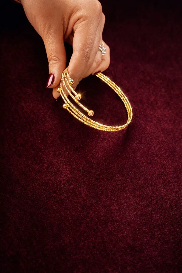 Gold-Toned_Multi-Strand_Adjustable_Bracelet_With_Ball_Accents