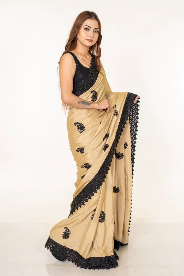 Beige_Chinnon_Saree_with_Black_Embroidered_Border