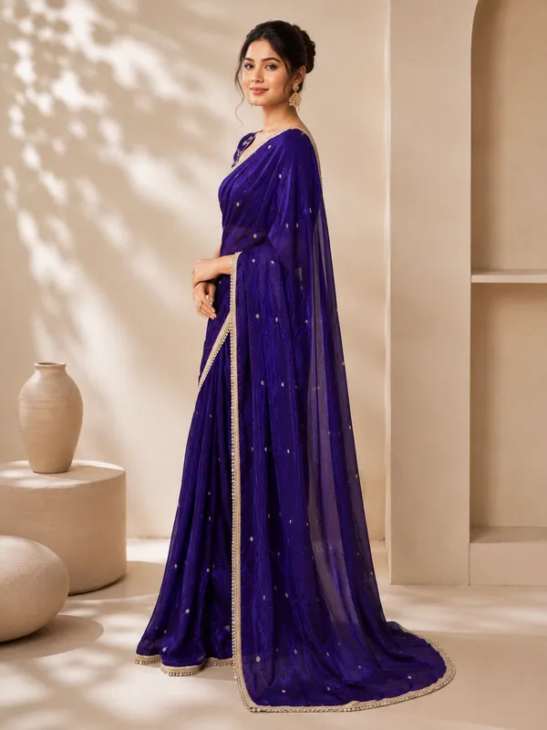 Elegant_Blue_Designer_Saree_with_Delicate_Golden_Embellished_Border
