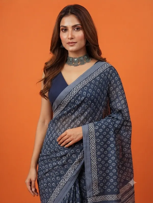 Elegant_Blue_Designer_Saree_with_Intricate_Traditional_Motif_Print_and_Geometric_Patterned_Border_for_Women