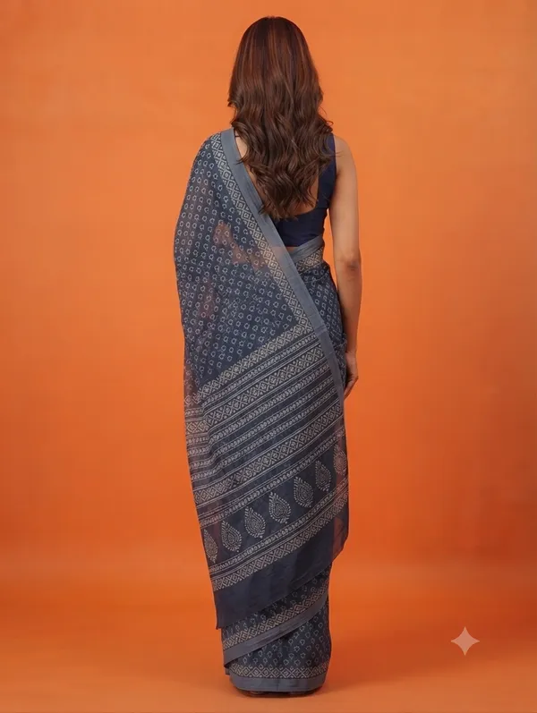 Elegant_Blue_Designer_Saree_with_Intricate_Traditional_Motif_Print_and_Geometric_Patterned_Border_for_Women