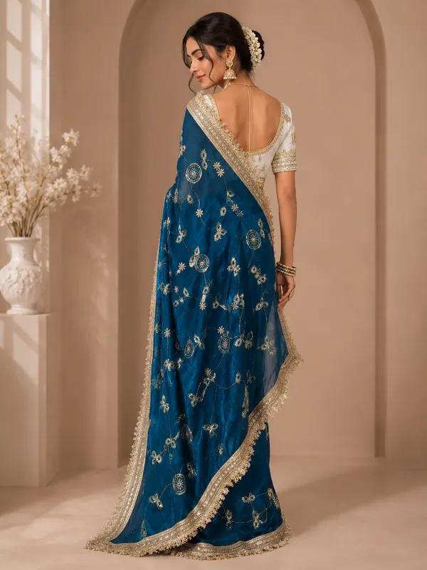 Elegant_Designer_Saree_with_Intricate_Golden_Floral_Embroidery_and_Embellished_Border_for_Women