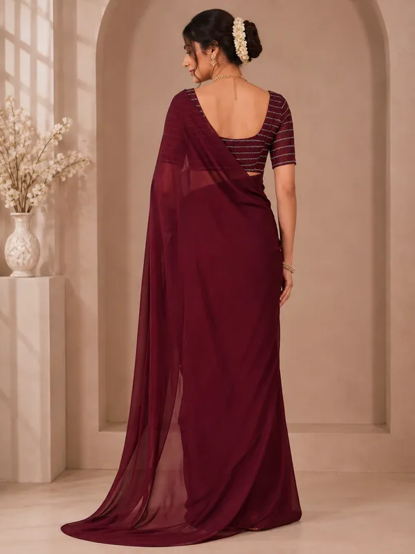 Elegant_Maroon_Designer_Saree_with_Subtle_Textured_Finish_for_Women