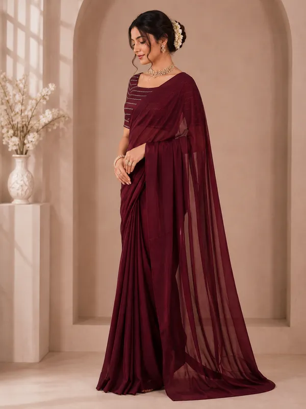 Elegant_Maroon_Designer_Saree_with_Subtle_Textured_Finish_for_Women