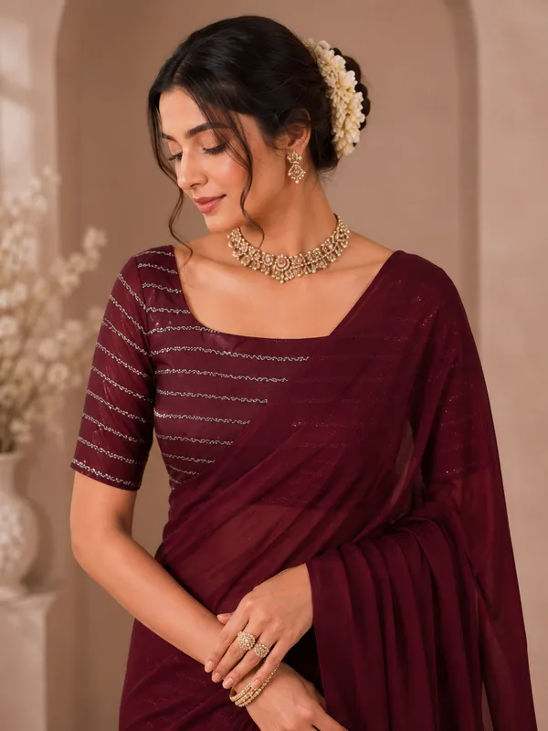 Elegant_Maroon_Designer_Saree_with_Subtle_Textured_Finish_for_Women