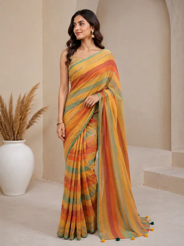 Yellow_Mul_Cotton_Saree_with_Multicolour_Striped_Border_&_Tassel_Detailing