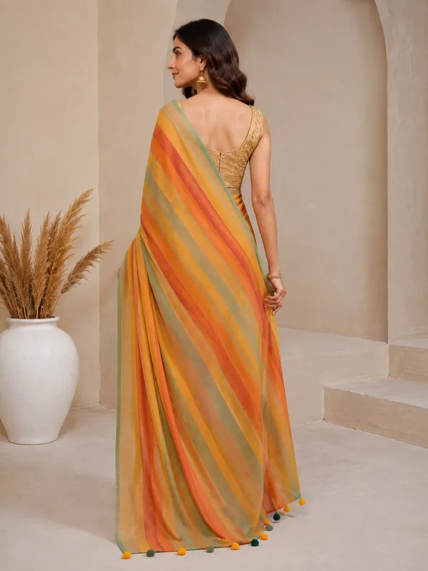 Yellow_Mul_Cotton_Saree_with_Multicolour_Striped_Border_&_Tassel_Detailing