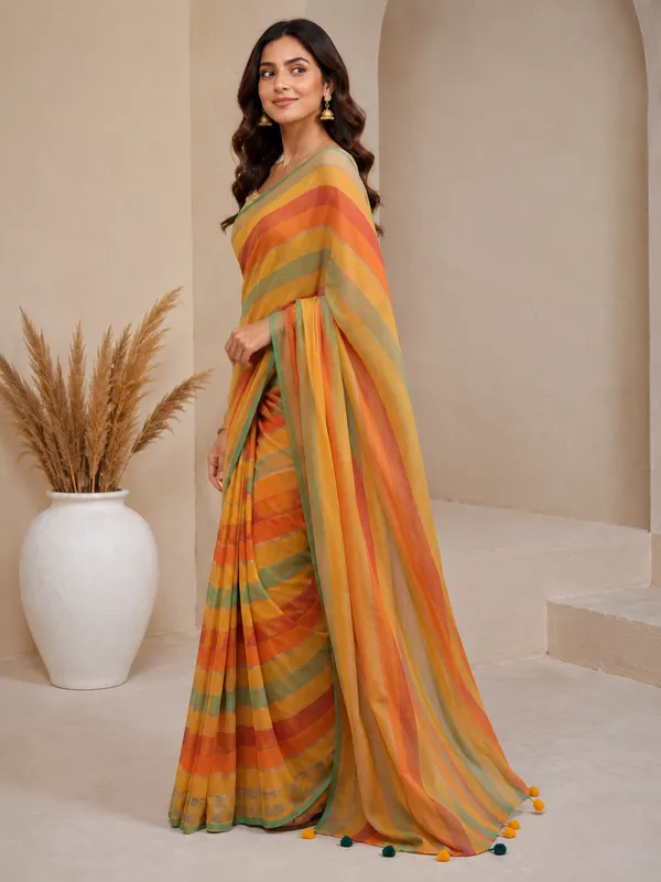 Yellow_Mul_Cotton_Saree_with_Multicolour_Striped_Border_&_Tassel_Detailing