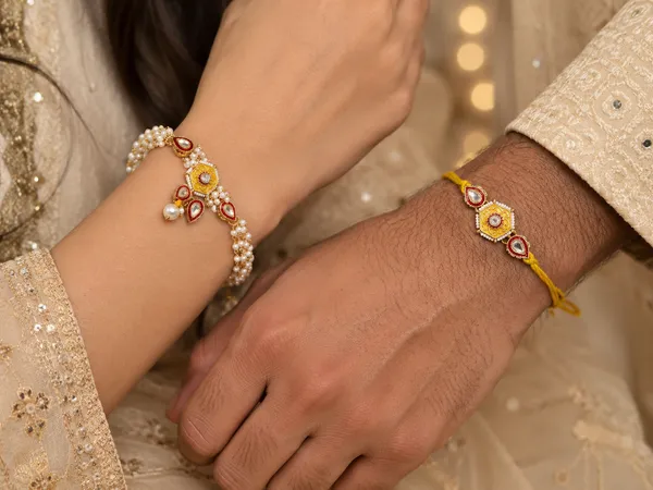 RAVUNÉ_Yellow_Eyes_Heritage_Kundan_and_Moti_Couple_Rakhi_(Bhaiya_Bhabhi)_For_Women_&_Men_