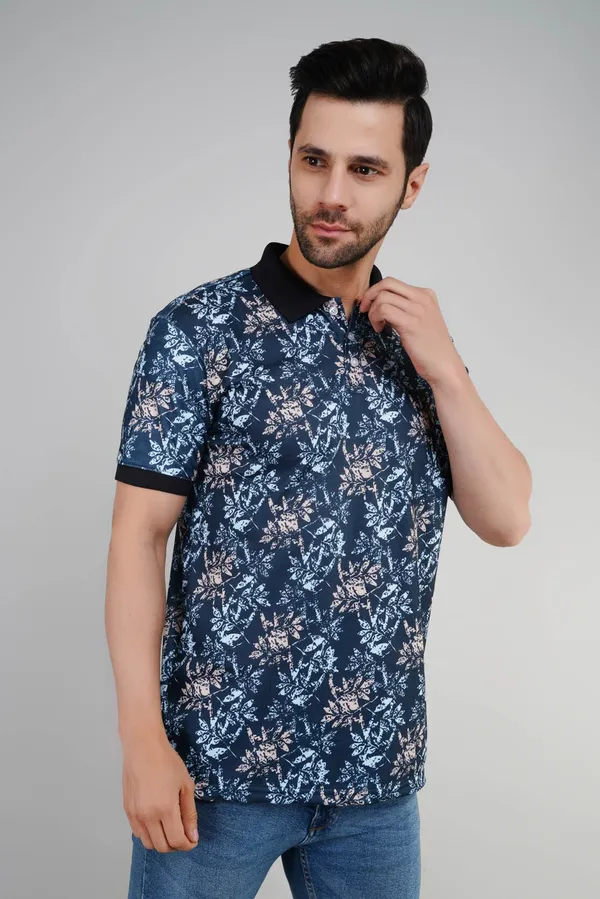 Valencia_Casual_Polo_tshirt_with_navy_blue_base_with_an_abstract_foliage_pattern