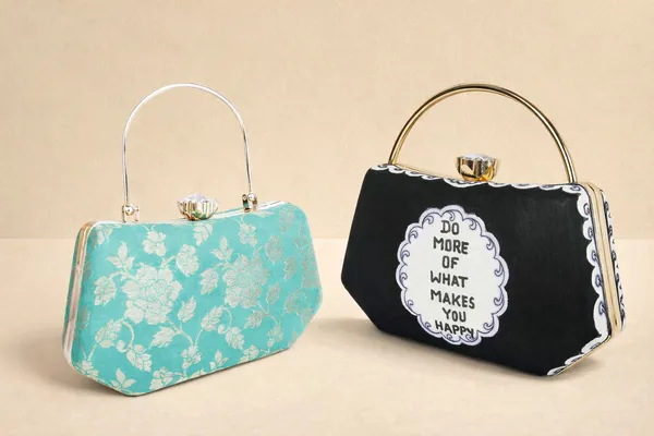 Turquoise_Banarasi_Jacquard_And_Black_Raw_Silk_Clutch_Bag_For_Women_Pack_Of_2
