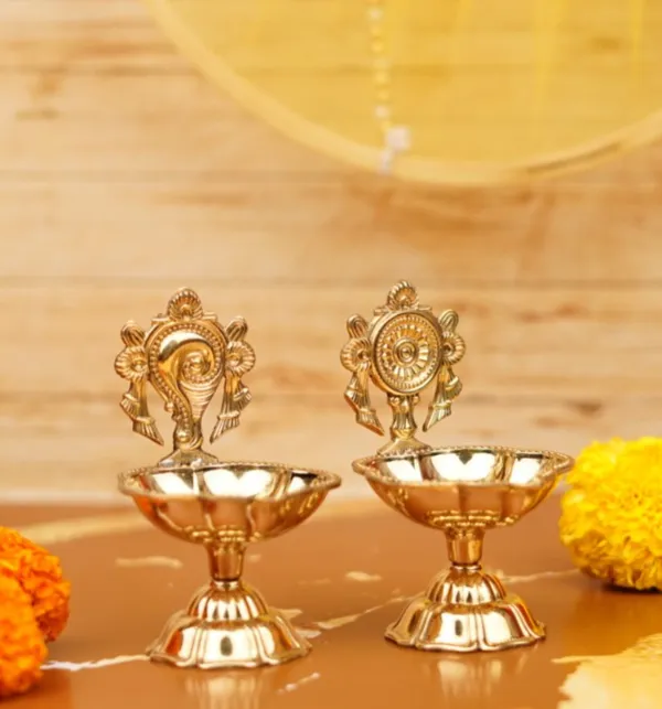 Brass_Decorative_Diya_Pair_with_Shankh_Chakra_Design