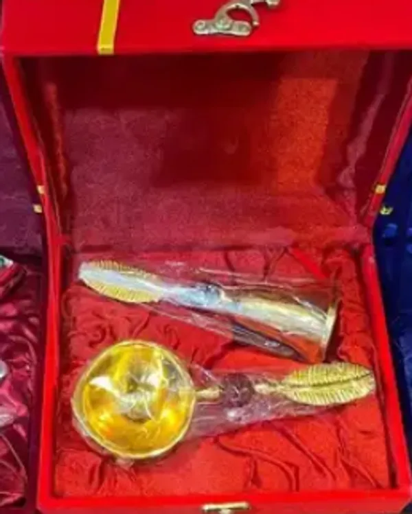 Golden_and_Silver_Pooja_Beel_With_Diya_Set_In_Red_Velvet_Box