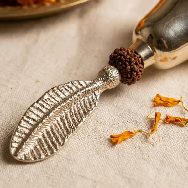 Silver_Toned_Decorative_Bell_With_Leaf_Handle