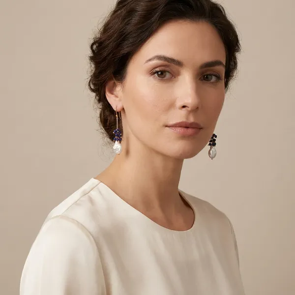 Elegant_Pearl_Drop_Earrings_With_Blue_Sapphire_Accents