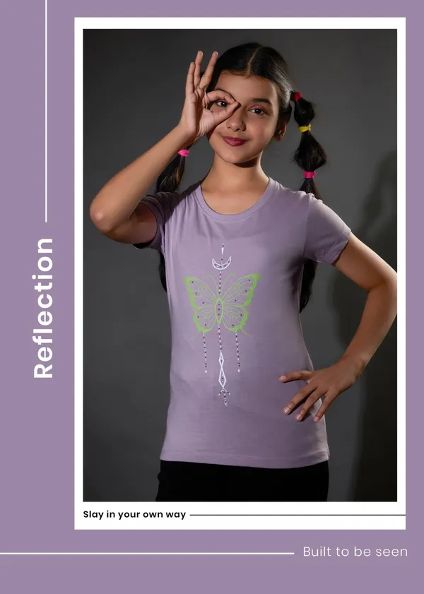 Girls'_Purple_Graphic_T-Shirt_With_Black_Pants_And_Zebra_Print_Bag