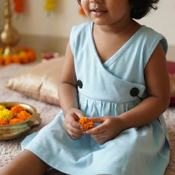Yellow_Bamboo_Cotton_Frock_With_Teddy_Style_Collar_And_Light_Blue_Sleeveless_Frock_With_Front_Button_Detailing_|_Pack_Of_2