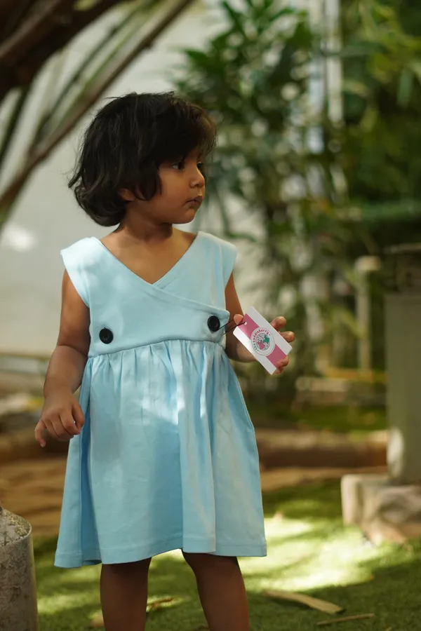 Yellow_Bamboo_Cotton_Frock_With_Teddy_Style_Collar_And_Light_Blue_Sleeveless_Frock_With_Front_Button_Detailing_|_Pack_Of_2