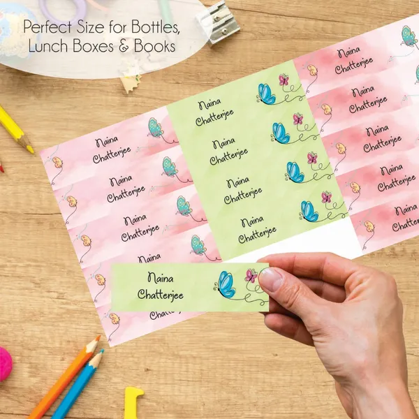Zooplay_India_Waterproof_Name_Stickers,_Pack_of_90_Personalized_Stickers_for_School,_Bottles,_Lunchboxes_&_Stationery_�_Durable,_Peel_&_Stick,_Dishwasher_Safe_Tags_(Magic_Wings)