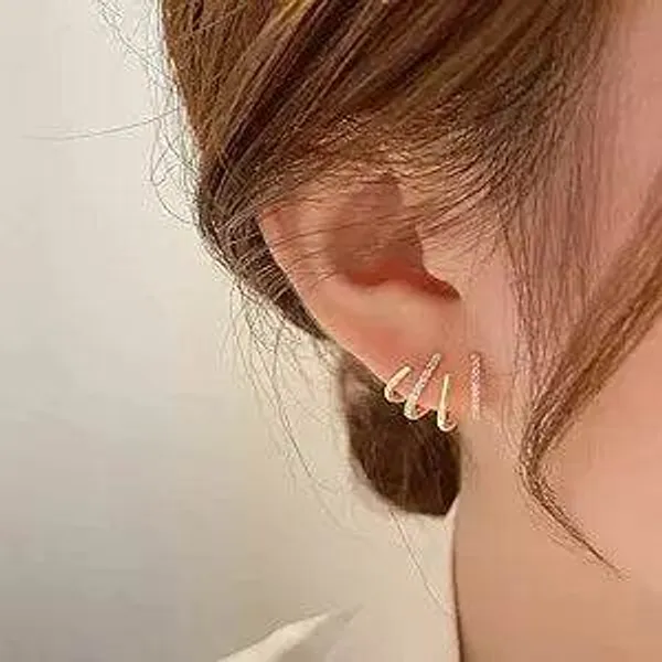 Delicate_Curved_Bar_Ear_Studs_In_Gold_Finish