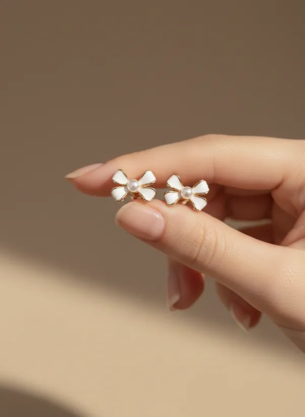 Enamelled_Bow_With_Pearl_Mini_Stud