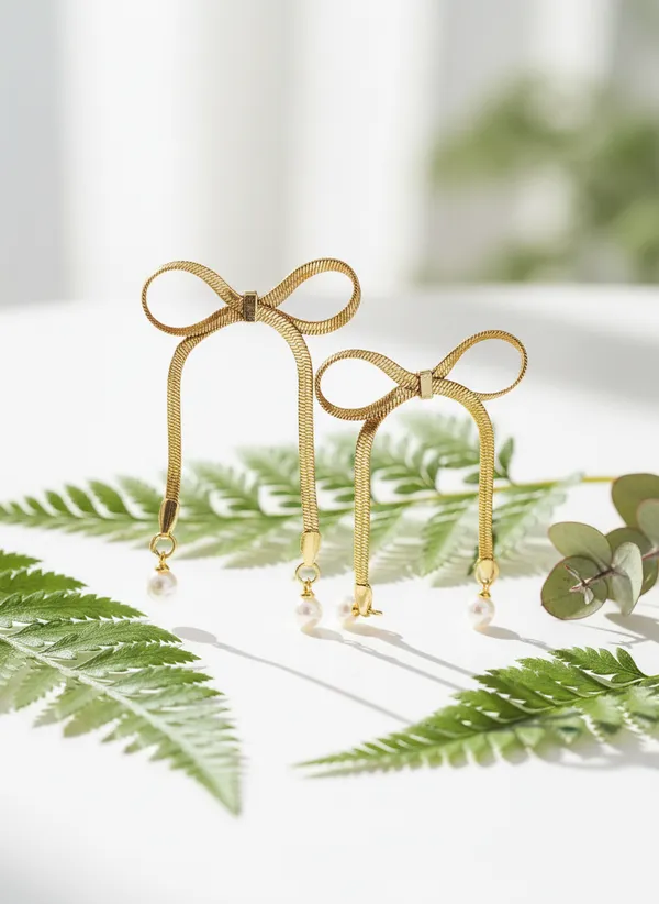 Whimsical_Elegant_Bow_Pearl_Drop_Earrings