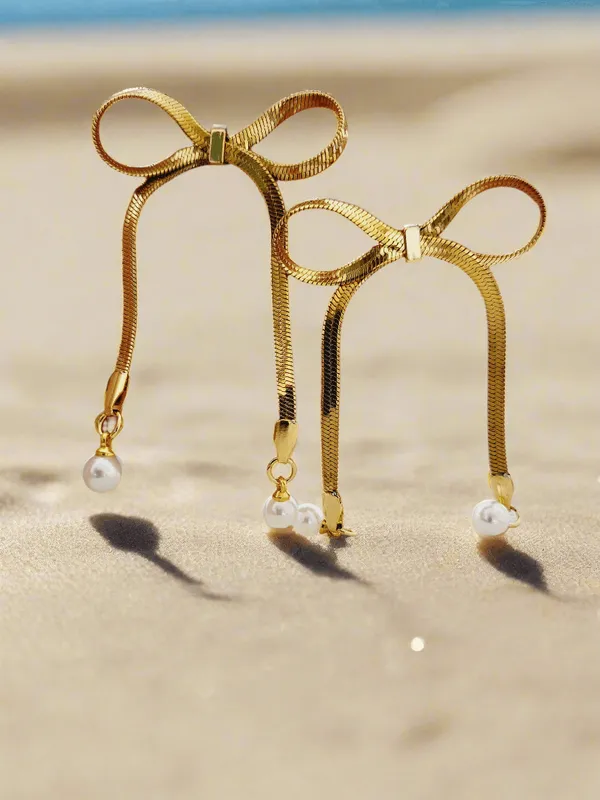 Whimsical_Elegant_Bow_Pearl_Drop_Earrings
