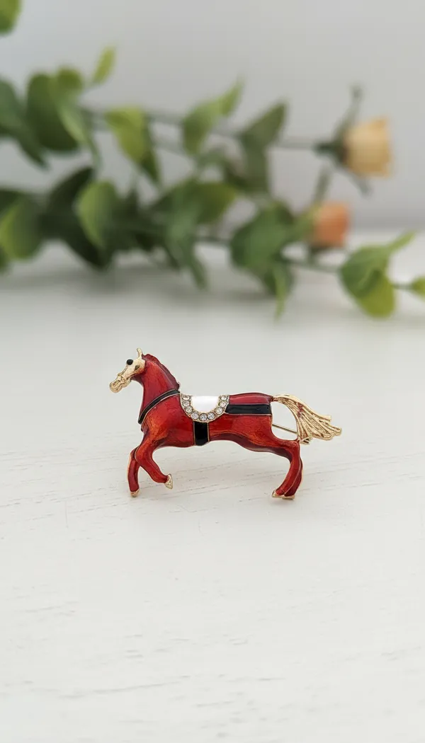 Gold_Tone_Equestrian_Brooch_With_Crystal_Saddle_brooch