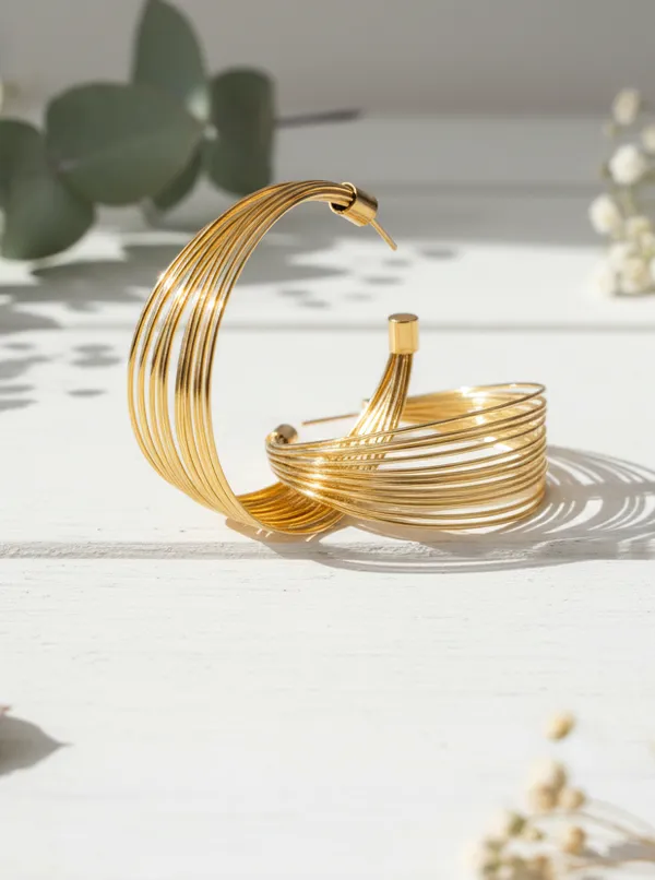 Sculptural_Wavy_Gold_Hoops