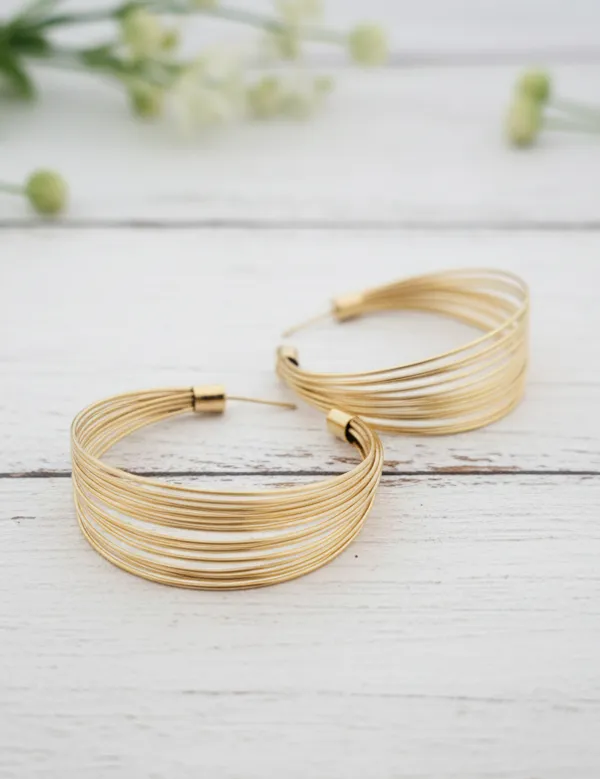 Sculptural_Wavy_Gold_Hoops