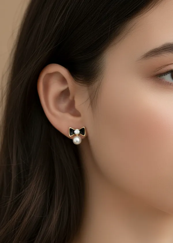 Enamelled_Bow_With_A_Diamond_Pearl_Mini_Studs