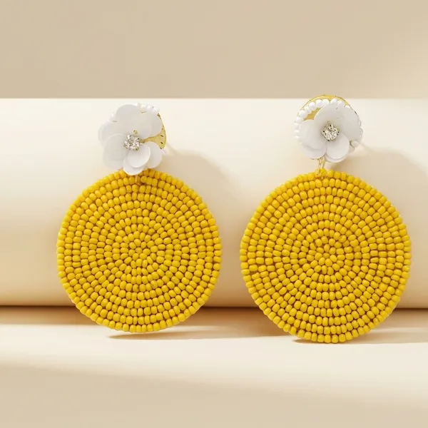 Beaded_Circle_Earrings_With_White_Flower_Accents