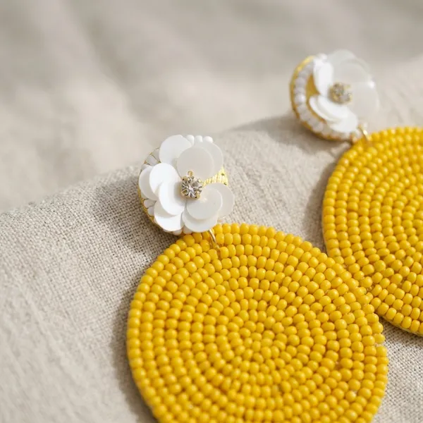 Beaded_Circle_Earrings_With_White_Flower_Accents