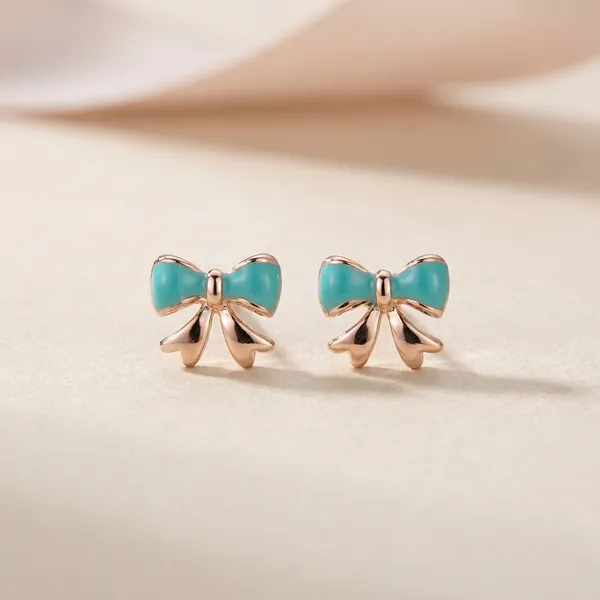Delicate_Enamelled_Mini_Bow_Studs
