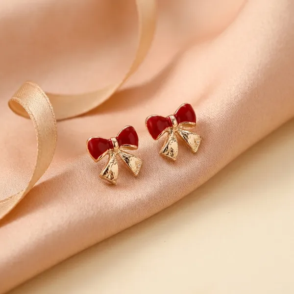 Delicate_Enamelled_Mini_Bow_Studs