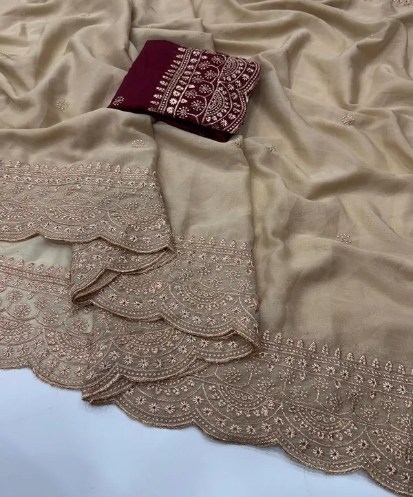 Elegant_Beige_Georgette_Saree_With_Embroidered_Border_And_Maroon_Blouse