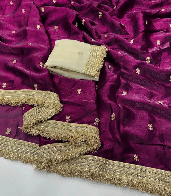Purple_Georgette_Saree_With_Golden_Border_And_Embroidered_Blouse
