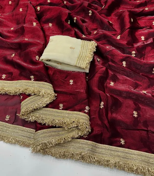 Maroon_Velvet_Saree_With_Golden_Embroidered_Border_And_Cream_Blouse_Piece