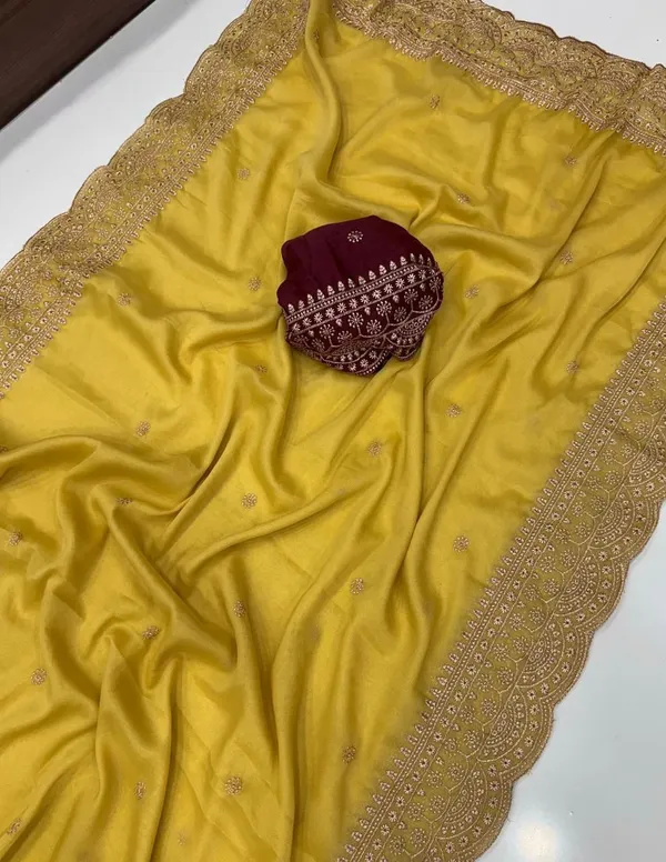 Yellow_Satin_Silk_Saree_With_Golden_Embroidered_Border_And_Maroon_Blouse_Piece