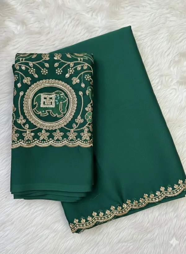 Elegant_Green_Ethnic_Saree_With_Golden_Embroidery