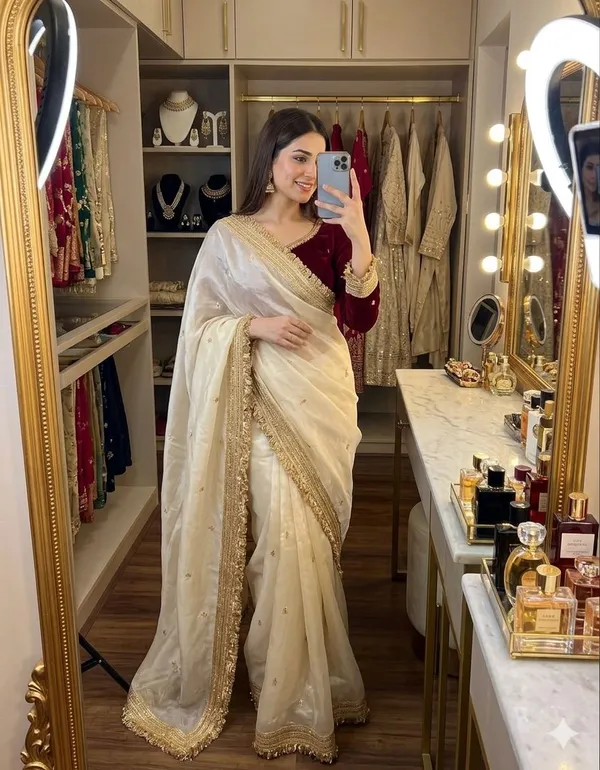 Elegant_Off_White_Embroidered_Saree_With_Maroon_Velvet_Blouse_And_Golden_Lace_Border