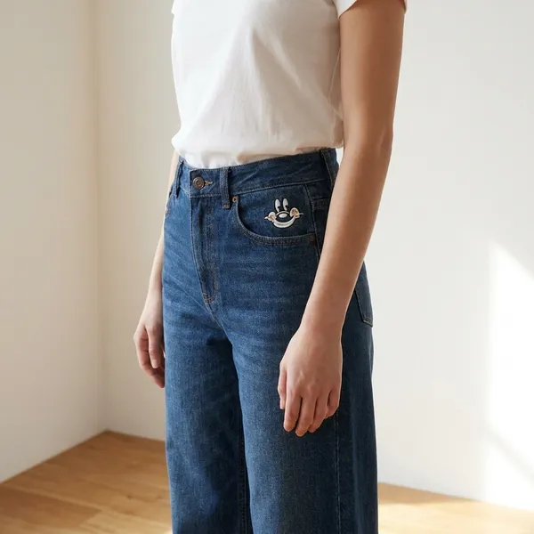 Blue_Wide_Leg_Denim_Jeans_With_Embroidered_Patch