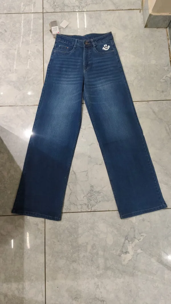Blue_Wide_Leg_Denim_Jeans_With_Embroidered_Patch