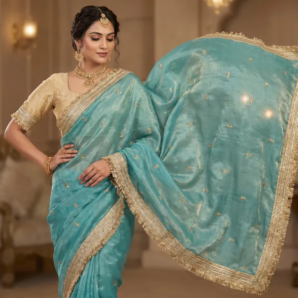 Fandy_sattin_Fabric_With_Beautiful_Sequence__butti__all_over__Saree_With_Rich_elegant_lace_on_either_side