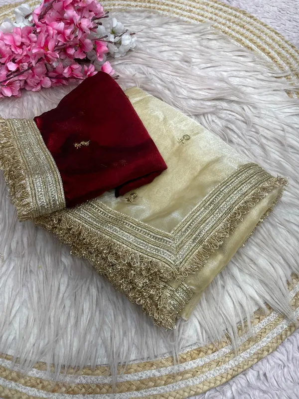 Fandy_sattin_Fabric_With_Beautiful_Sequence__butti__all_over__Saree_With_Rich_elegant_lace_on_either_side