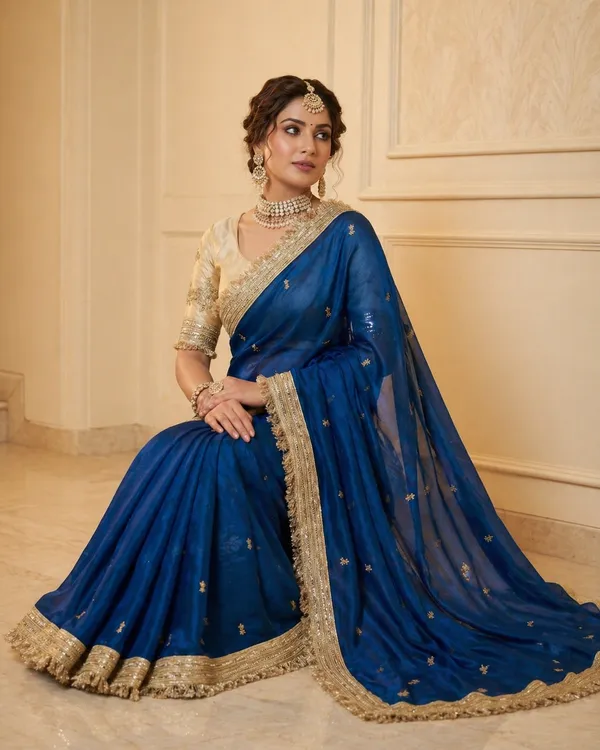 Fandy_sattin_Fabric_With_Beautiful_Sequence__butti__all_over__Saree_With_Rich_elegant_lace_on_either_side