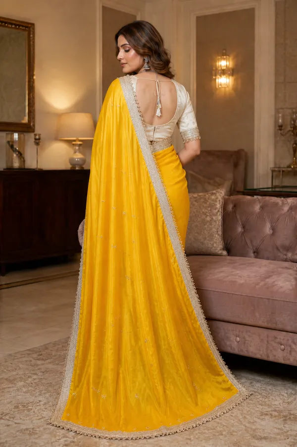 Fandy_sattin_Fabric_With_Beautiful_Sequence__butti__all_over__Saree_With_Rich_elegant_lace_on_either_side