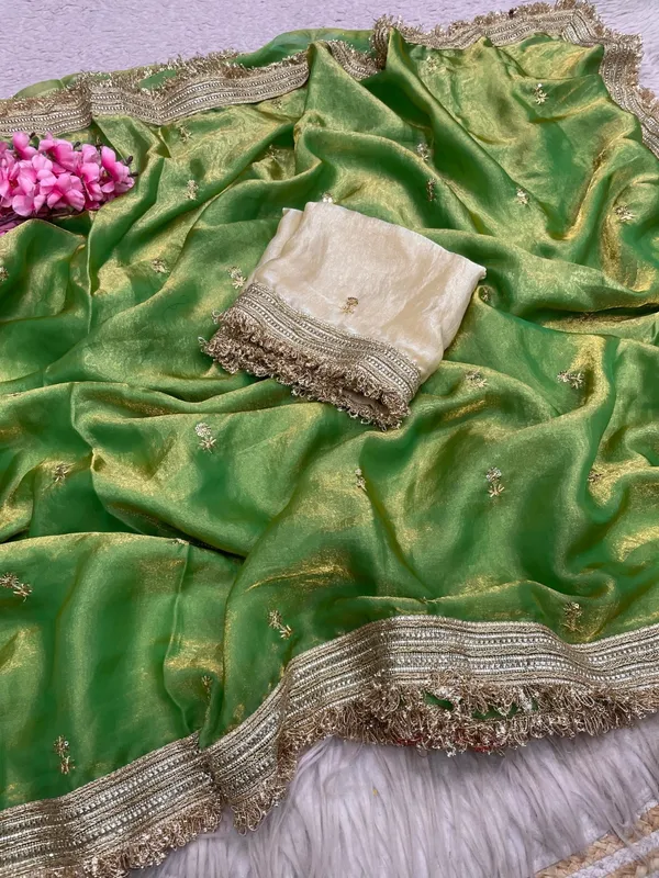 Fandy_sattin_Fabric_With_Beautiful_Sequence__butti__all_over__Saree_With_Rich_elegant_lace_on_either_side