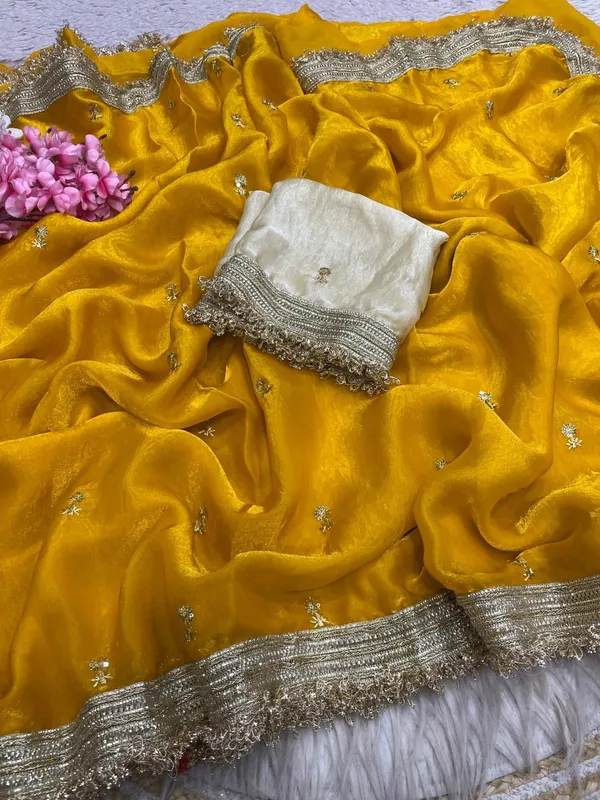 Fandy_sattin_Fabric_With_Beautiful_Sequence__butti__all_over__Saree_With_Rich_elegant_lace_on_either_side